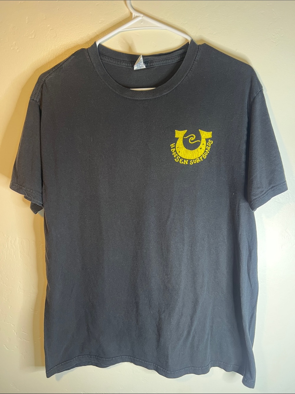 Black Short-Sleeve Tee with Yellow Surf Logo